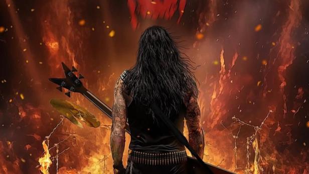 Ein Gitarrist steht vor einer Bühne mit dem Schriftzug „The Art of Destruction“ im Hintergrund.