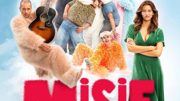 Das Filmplakat für „Misie“ zeigt eine Gruppe von Schauspielern in flauschigen Kostümen und den Titel des Films.