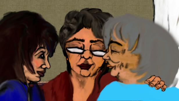 Drei ältere Frauen unterhalten sich angeregt.