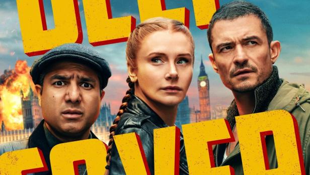 Das Filmplakat für „Deep Cover“ zeigt drei Schauspieler vor dem Hintergrund des brennenden Big Ben.