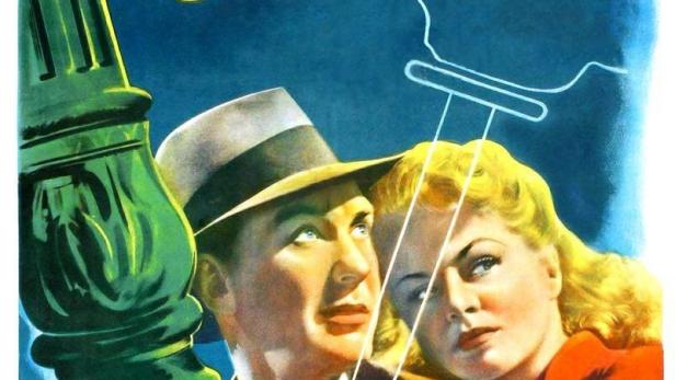 Das Filmplakat für „Street of Chance“ zeigt ein Paar vor einer dunklen Gasse.