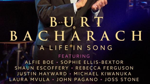 Das Cover von „Burt Bacharach: A Life in Song“ zeigt Burt Bacharach und eine Gruppe von Sängern auf einer Bühne.