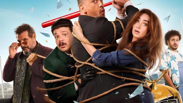 Das Filmplakat für „El Shaket“ zeigt eine Gruppe von Schauspielern, die mit Seilen gefesselt sind.