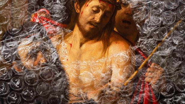 Das Filmplakat für „Il Caravaggio Perduto“ zeigt ein Gemälde von Jesus mit Dornenkrone, verpackt in Luftpolsterfolie.