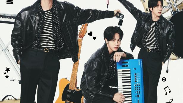 Ein Werbeplakat für die „Run Seok Jin EP. Tour“ mit dem Sänger Jin und verschiedenen Musikinstrumenten.