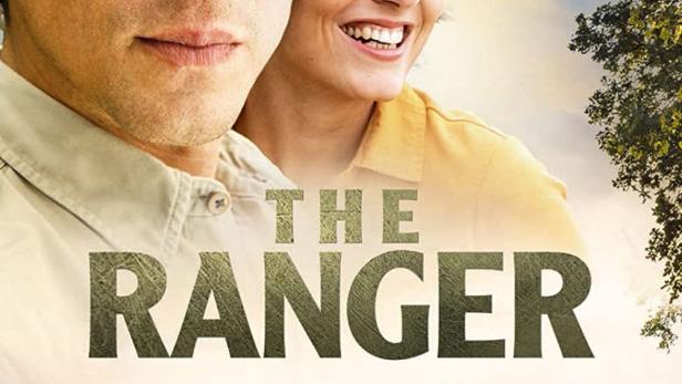 Das Filmplakat für „The Ranger“ zeigt einen Mann, eine Frau und einen Wolf in einer Waldlandschaft.