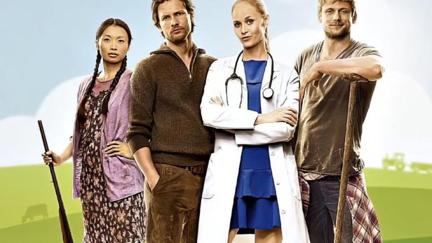 Das Filmplakat zu „Doc meets Dorf“ zeigt vier Personen vor einer ländlichen Kulisse.