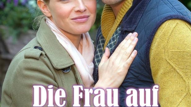 Ein Mann und eine Frau umarmen sich auf dem Cover von „Die Frau auf der Klippe“.