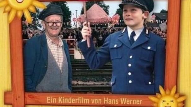 Das Filmplakat für „Des kleinen Lokführers große Fahrt“ zeigt einen Jungen als Lokführer und einen älteren Mann.