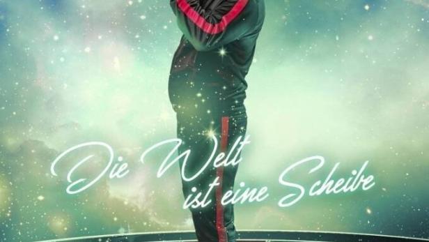 Ein Mann mit Dartpfeilen steht auf einer Dartscheibe, im Hintergrund das Logo der Serie „Die Wespe“.