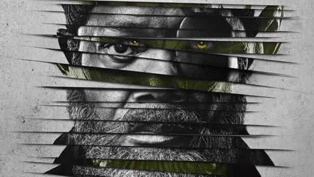 Das Poster für „Secret Invasion“ zeigt Nick Fury, dessen Gesicht teilweise von grüner Skrull-Haut überlagert wird.