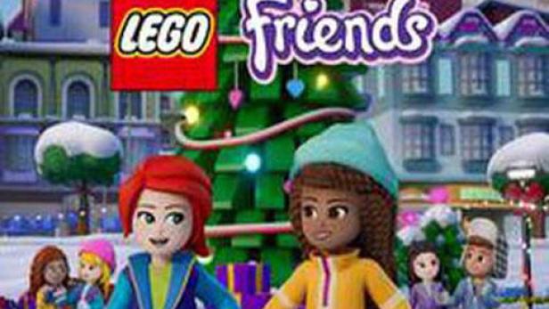 Zwei Lego Friends-Figuren laufen vor einem Weihnachtsbaum Schlittschuh.