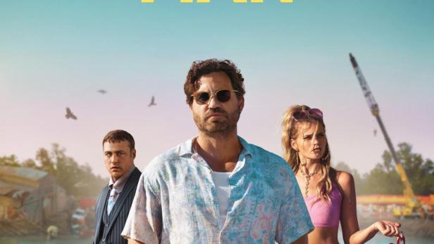 Das Filmplakat für „Florida Man“ zeigt einen Mann, eine Frau, einen Mann im Anzug und ein Krokodil im Wasser.