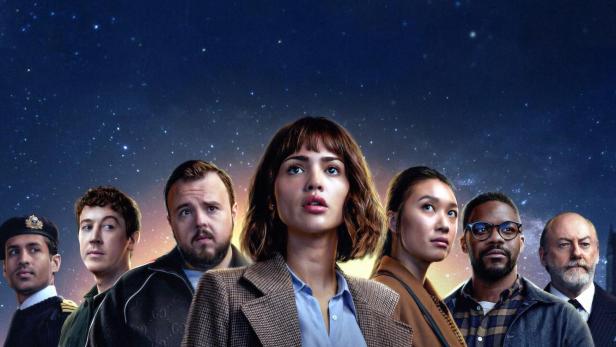 Das Filmplakat für „3 Body Problem“ zeigt die Hauptdarsteller vor einem Sternenhimmel.