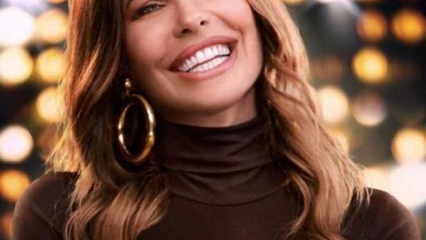 Das Poster für die Netflix-Serie „Ilary“ zeigt eine lächelnde Frau vor einem Bokeh-Hintergrund.