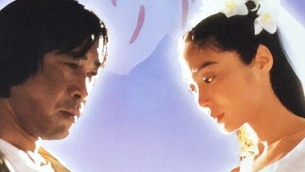 Ein Mann und eine Frau im Brautkleid auf dem Filmplakat zu „101回目のプロポーズ“.