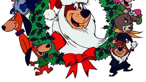 Das Cover von „Yogi’s First Christmas“ zeigt Yogi Bär und Freunde in einem Weihnachtskranz.