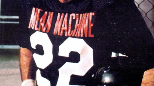Burt Reynolds als Footballspieler in dem Film „Die härteste Meile“.