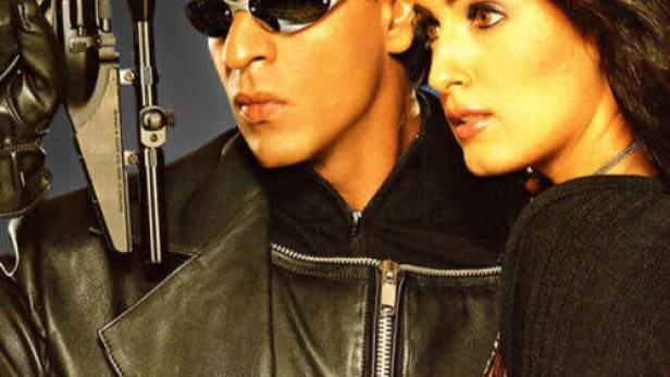 Das Filmplakat für „Baadshah“ zeigt Shah Rukh Khan mit einer Waffe.