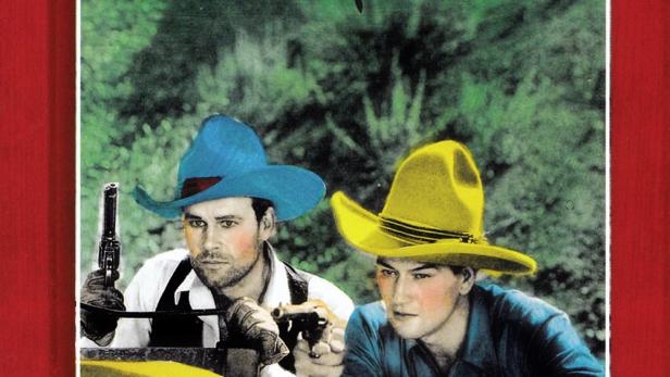 Das DVD-Cover von „Desperado Man“ mit John Wayne als Cowboy mit gelbem Hut und Waffe.