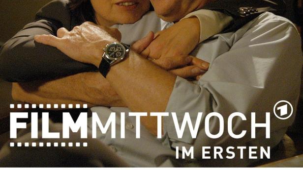 Ein Mann und eine Frau umarmen sich; Filmposter für „Mein Mann, der Trinker“.