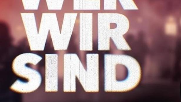 Das Logo der ARD-Dokumentation „Wer wir sind“ vor verschwommenem Hintergrund.