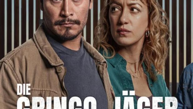 Das Filmplakat für „Die Gringo-Jäger“ zeigt zwei bewaffnete Personen vor einer Grenzmauer.