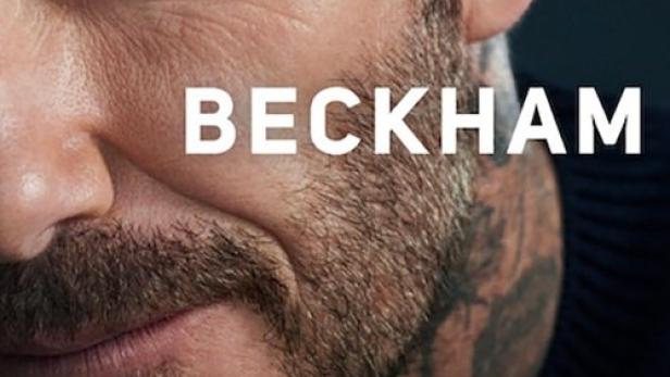 Detailaufnahme von David Beckhams Gesicht mit Bart und Tätowierung am Hals.