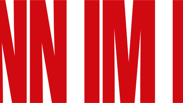 Der Schriftzug „Man I'm Bad“ in roter Schrift auf schwarzem Hintergrund.