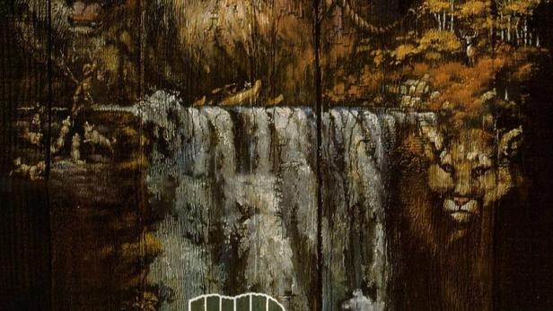 Ein Gemälde mit einem Mann, einem Wolf, einem Wasserfall und dem Schriftzug „White Water Sam“.