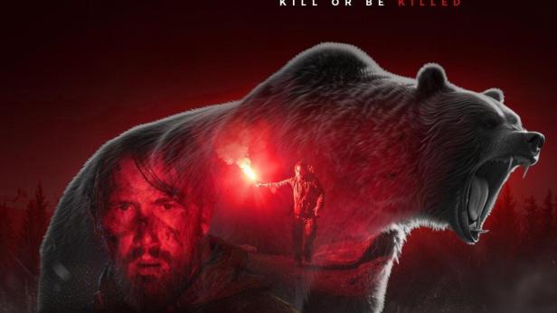 Das Filmplakat für „Savage Hunt“ zeigt einen Mann mit einer Fackel vor einem Grizzlybären.