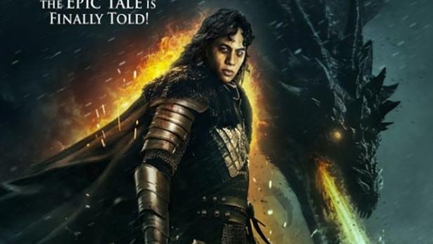 Ein Hexenjäger mit Schwert steht vor einem feuerspeienden Drachen.