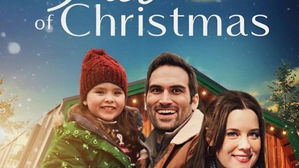 Das Filmplakat für „The Picture of Christmas“ zeigt eine Familie mit einem Weihnachtsbuch.