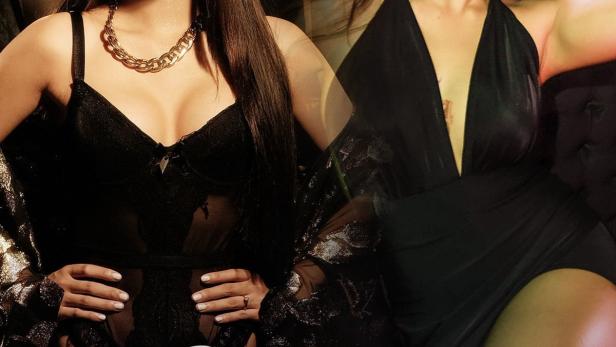 Zwei asiatische Frauen posieren vor dem Schriftzug „Ganti-Ganti“.