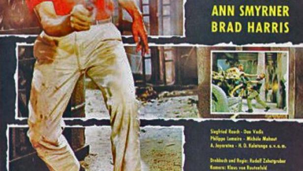 Ein Filmposter für „Kommissar X – Drei gelbe Katzen“ mit Tony Kendall, der eine Waffe abfeuert.