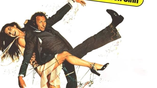 Das Filmplakat für „Der große Blonde mit dem schwarzen Schuh“ zeigt Pierre Richard mit Mireille Darc.