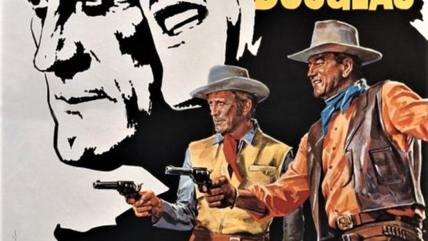 Das Filmplakat für „Die Gewaltigen“ mit John Wayne und Kirk Douglas.