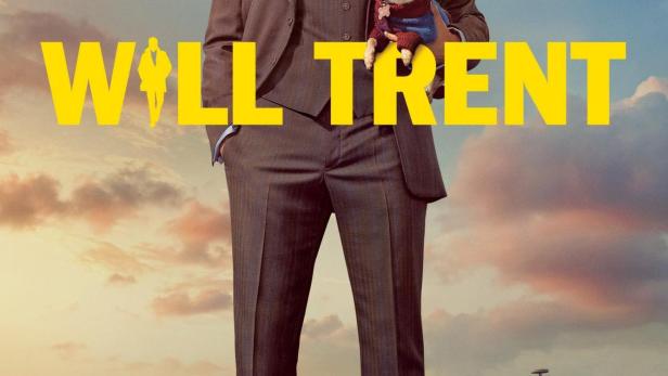 Das Poster für „Will Trent“ zeigt einen Mann im Anzug, der einen Chihuahua vor der Skyline von Atlanta hält.