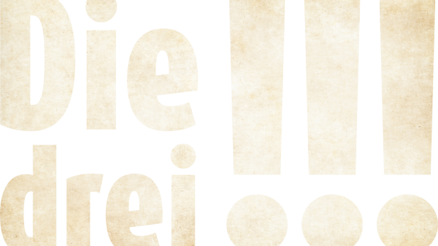 Der Schriftzug „Die drei !!!“ auf beigem Papier mit schwarzem Hintergrund.