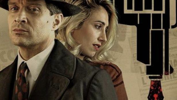 Das Filmplakat für „L'Ora“ zeigt einen Mann mit Hut und eine Frau vor einer Pistole, die in eine Feder übergeht.