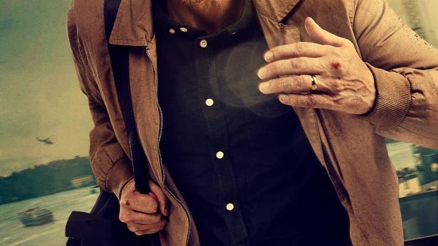 Ein Mann mit blutigem Gesicht rennt auf dem Filmplakat zu „Maskineriet“.