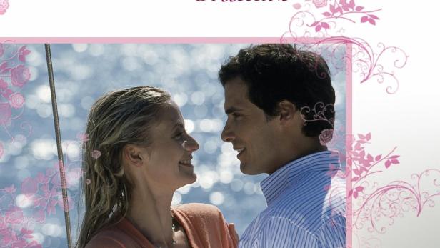 Ein Paar auf einem Segelboot, Titelbild für „Segel der Liebe“ aus der Rosamunde Pilcher Collection.