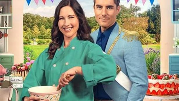Das Filmplakat für „The Royal Bake Off“ zeigt eine Frau mit Kochjacke und einen Mann in Prinzenuniform.