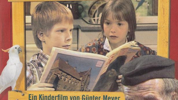 Das Filmplakat für „Wenn's donnert, blüht der Gummibaum“ zeigt zwei Kinder und einen Mann.