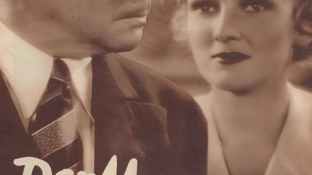 Plakat für den Film „Der Mann mit der Pranke“ mit den Porträts eines Mannes und einer Frau.