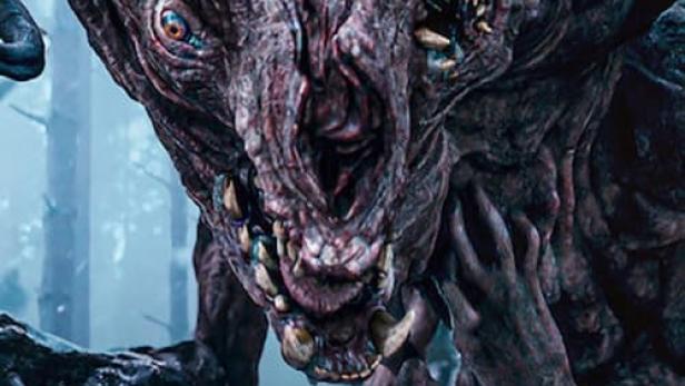 Ein Monster aus der Serie „The Witcher: Staffel 2“ mit gelben Augen und scharfen Zähnen.