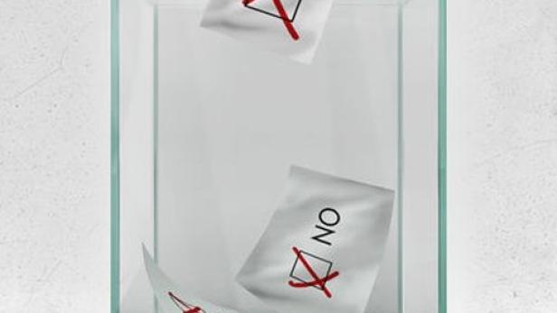 Ein durchsichtiger Wahlurne mit Stimmzetteln für „Ja“ und „Nein“.