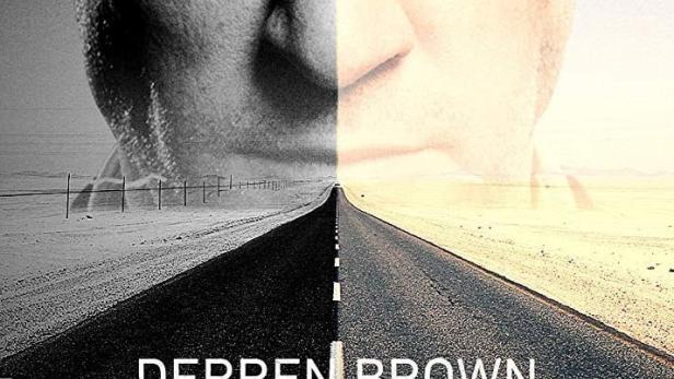 Das Filmplakat für „Sacrifice“ mit Derren Brown zeigt eine Straße, die sich in sein Gesicht teilt.