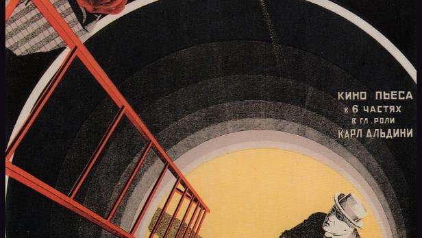 Ein Mann mit roter Maske blickt auf einen Mann mit Hut, der in einen Schacht fällt.