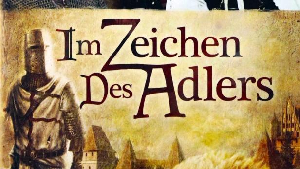 Das Cover der DVD „Im Zeichen des Adlers“ zeigt Ritter, Männer und einen Adler.